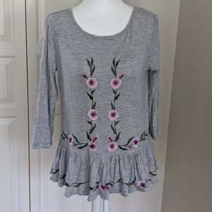 Embroidered peplum top